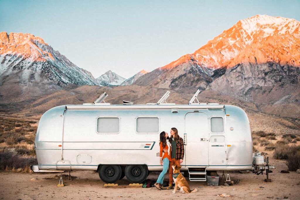 Young couple on the road exemplifying a digital nomad lifestyle