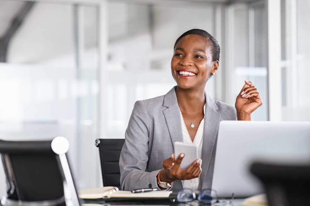 Young Black business woman learning how to improve time management skills at work