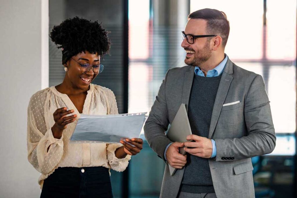 man supporting woman in leadership