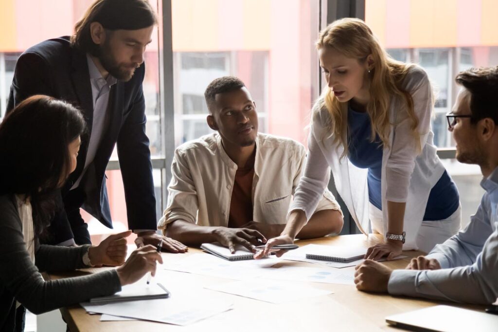 next generation leaders around a table in an office