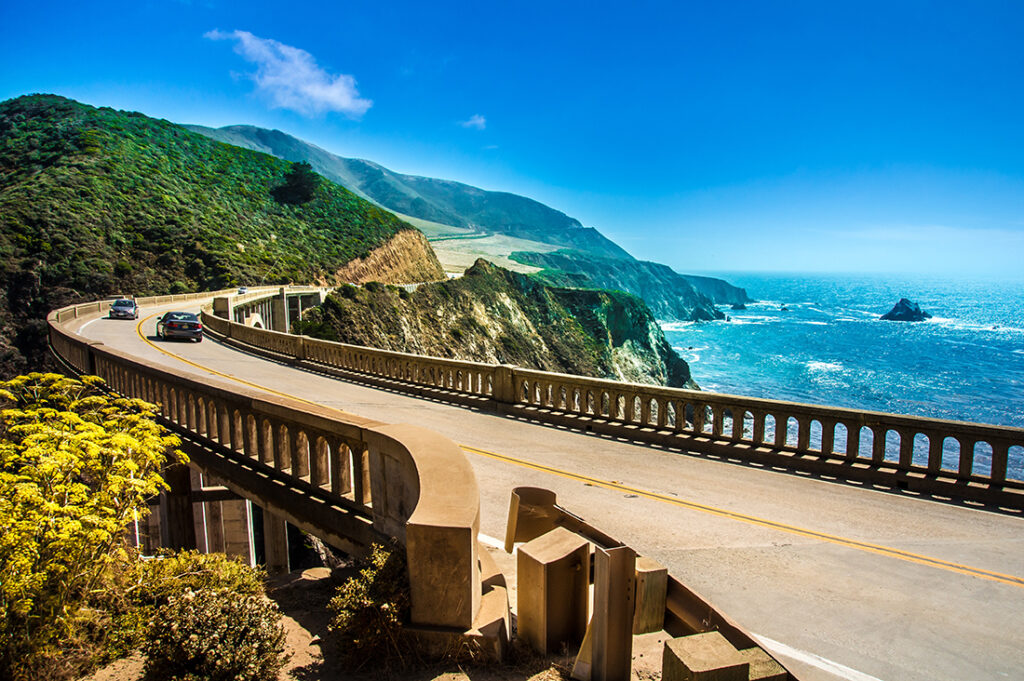 car crossing bridge in Big Sur, California